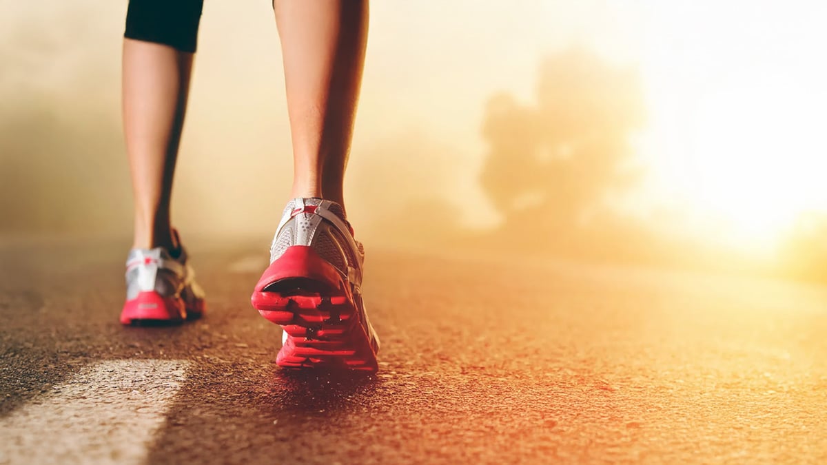 Walking on the road in golden light