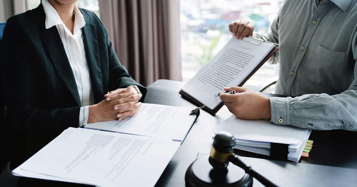 Legal documents signing on desk