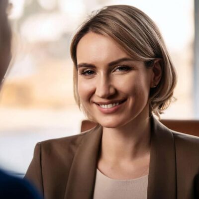 Professional woman smiling during conversation